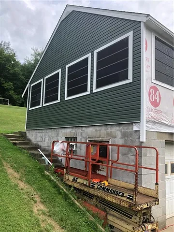 a bathroom with a toilet a sink and a shower
