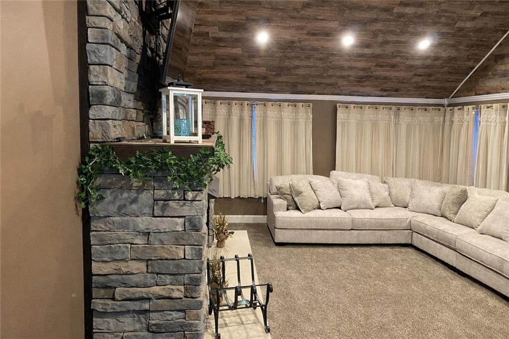 989 Blackhawk Road Beaver Falls, PA 15010 - Photo 6 of 18 a living room with furniture and a potted plant