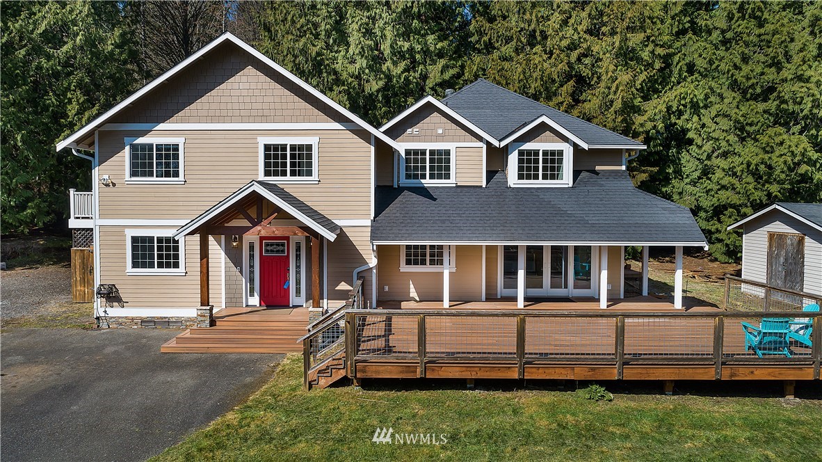 17325 3rd Avenue Southeast Bothell, WA 98012 - Photo 1 of 40 a front view of a house with a yard