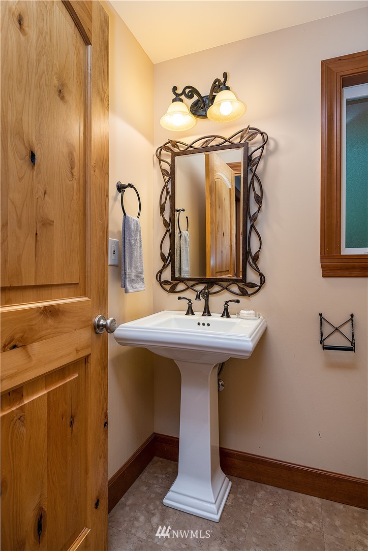 17325 3rd Avenue Southeast Bothell, WA 98012 - Photo 16 of 40 a bathroom with a sink and mirror