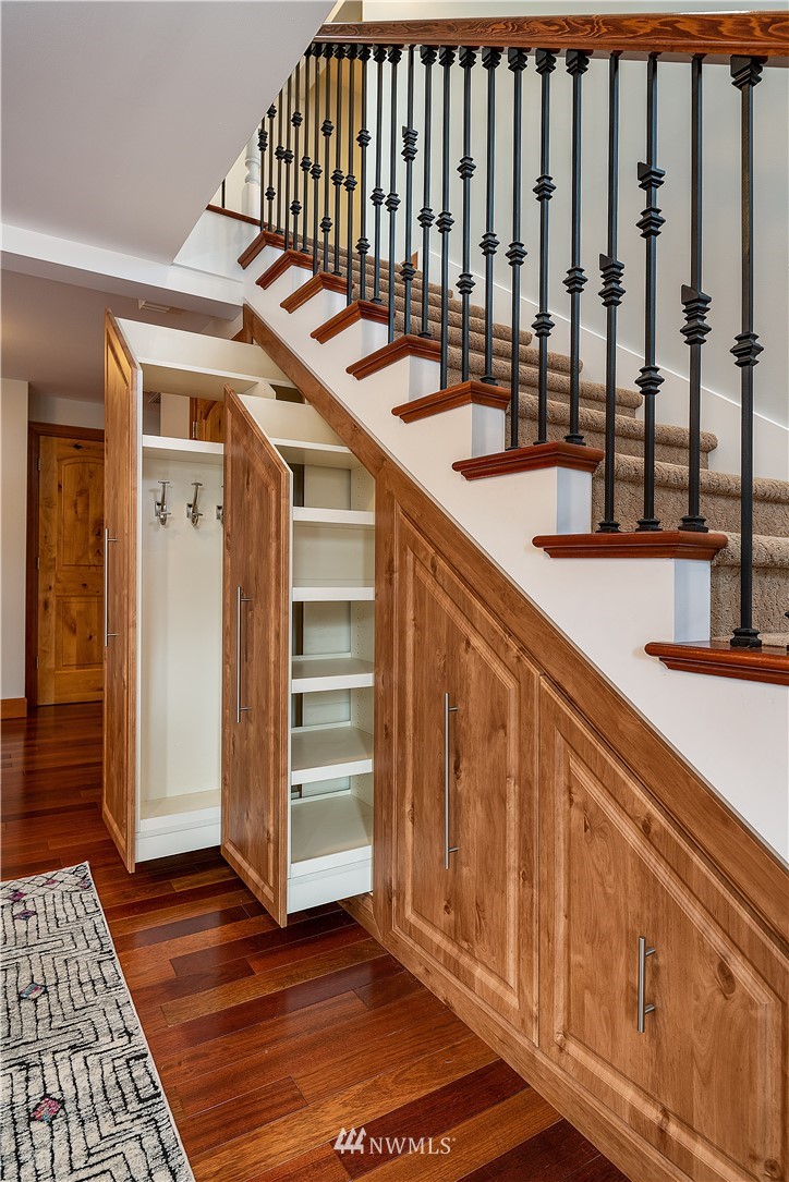 17325 3rd Avenue Southeast Bothell, WA 98012 - Photo 17 of 40 a view of a hallway with wooden floor and staircase
