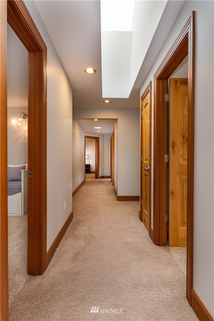 17325 3rd Avenue Southeast Bothell, WA 98012 - Photo 18 of 40 a view of hallway with livingroom