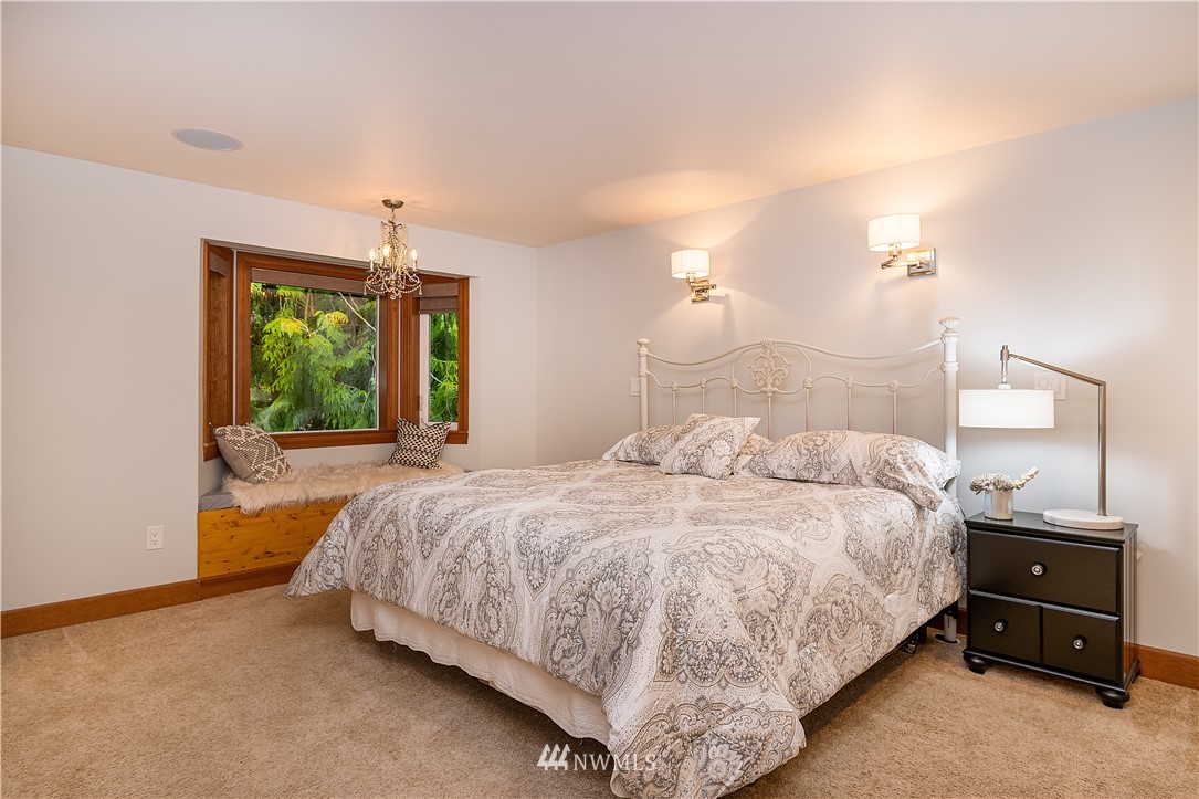 17325 3rd Avenue Southeast Bothell, WA 98012 - Photo 19 of 40 a bedroom with a bed and a window