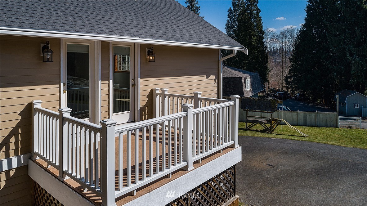 17325 3rd Avenue Southeast Bothell, WA 98012 - Photo 28 of 40 a view of a house with wooden fence and porch