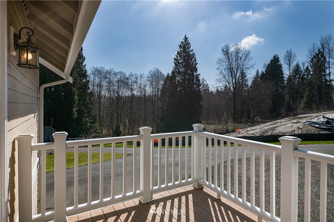 17325 3rd Avenue Southeast Bothell, WA 98012 - Photo 29 of 40 a view of a wooden deck with a backyard