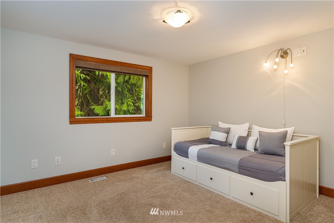 17325 3rd Avenue Southeast Bothell, WA 98012 - Photo 30 of 40 a living room with furniture and a window