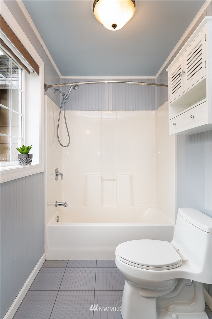 17325 3rd Avenue Southeast Bothell, WA 98012 - Photo 34 of 40 a bathroom with a toilet and a shower
