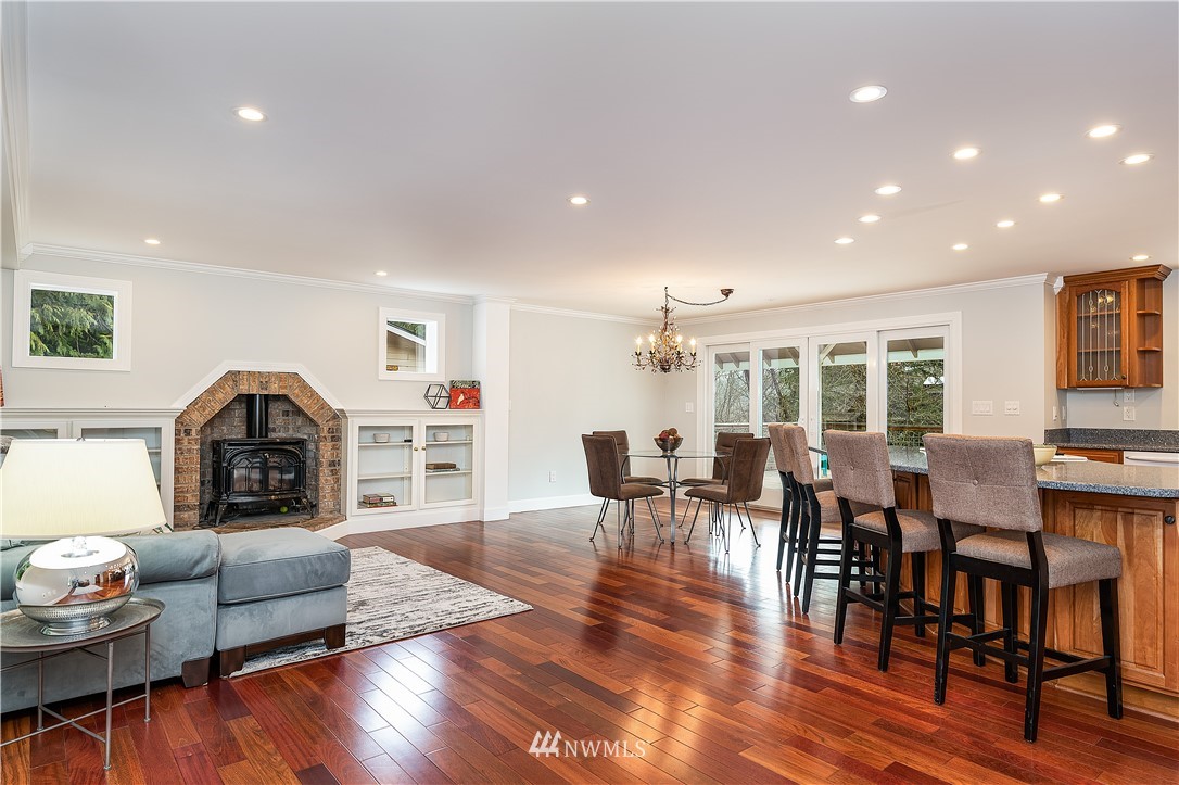 17325 3rd Avenue Southeast Bothell, WA 98012 - Photo 6 of 40 a living room with furniture and a wooden floor