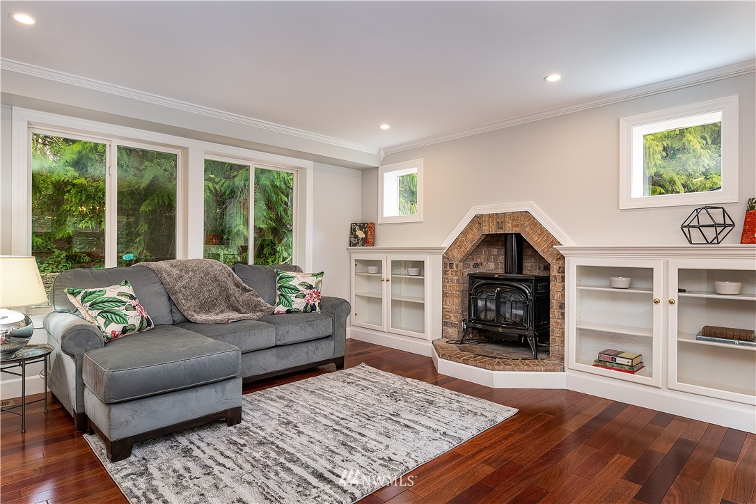 17325 3rd Avenue Southeast Bothell, WA 98012 - Photo 8 of 40 a living room with furniture and a fireplace
