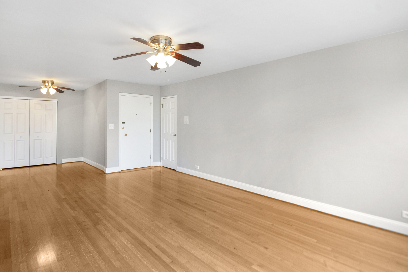 1951 Euclid Avenue, Unit 202 Berwyn, IL 60402 - Photo 11 of 16 a view of an empty room and wooden floor