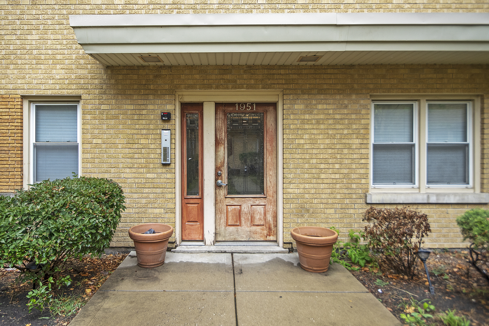 1951 Euclid Avenue, Unit 202 Berwyn, IL 60402 - Photo 16 of 16 a front view of a house with a chairs