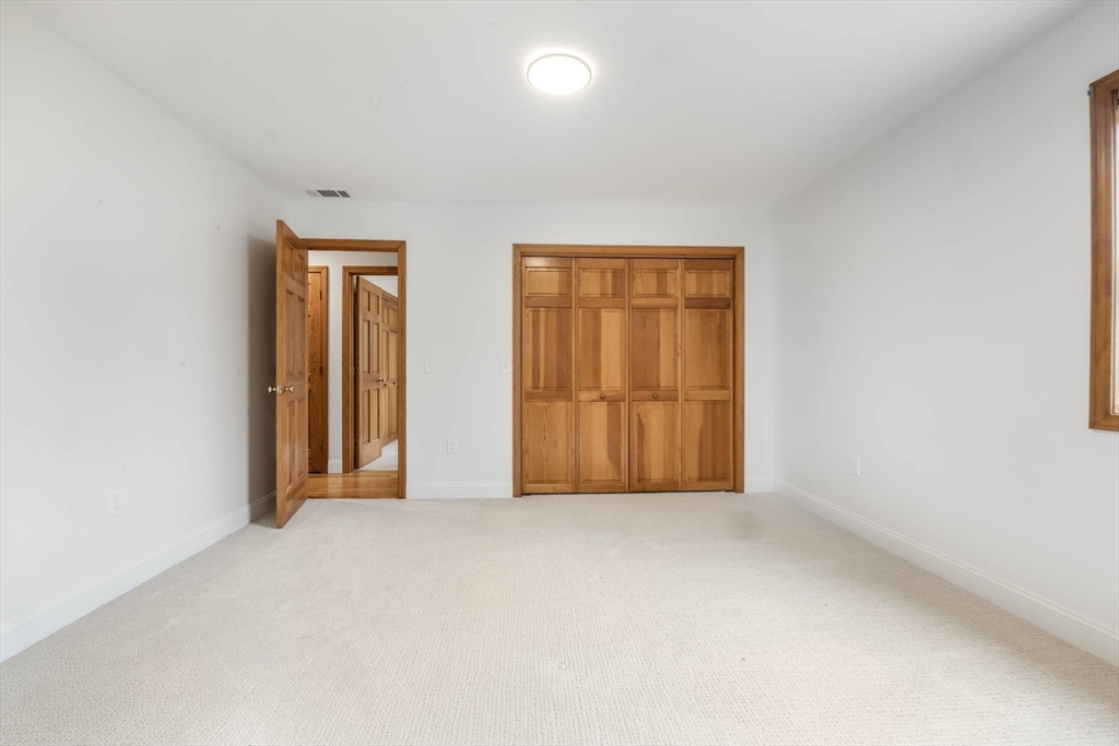 10 Alden Street Ludlow, MA 01056 - Photo 20 of 41 an empty room with windows and closet