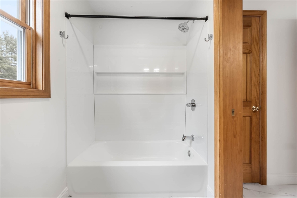 10 Alden Street Ludlow, MA 01056 - Photo 24 of 41 a bathroom with a bathtub
