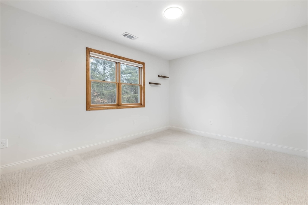 10 Alden Street Ludlow, MA 01056 - Photo 25 of 41 an empty room with a window