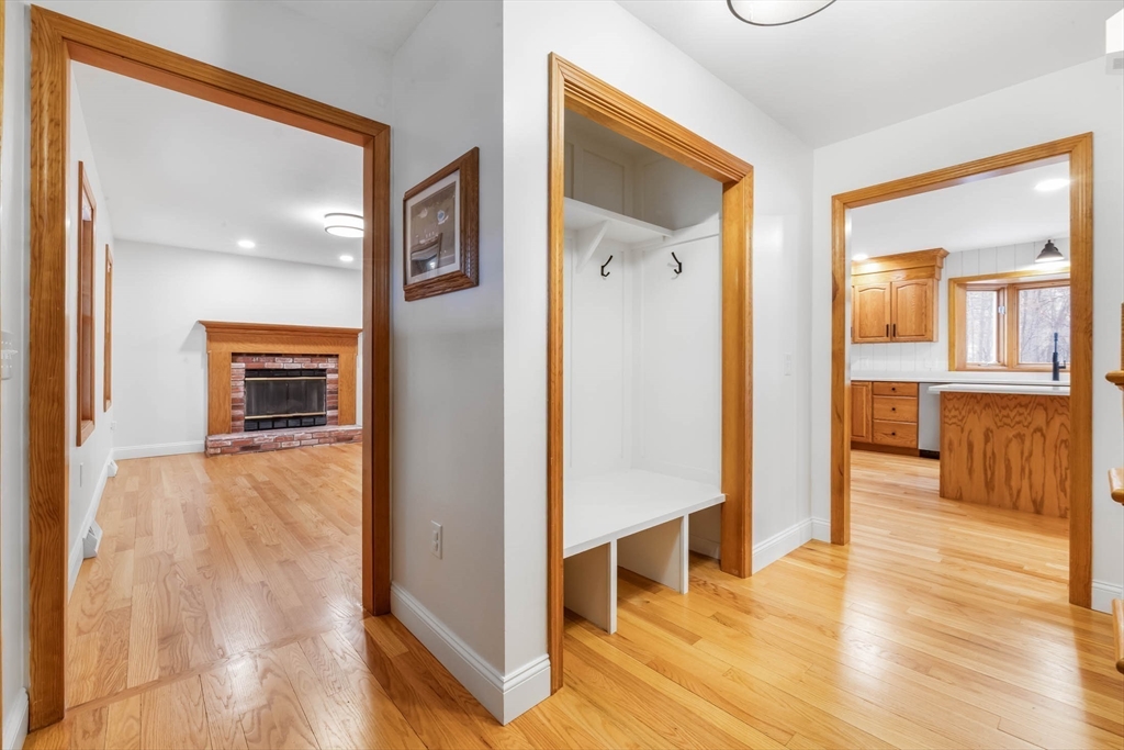 10 Alden Street Ludlow, MA 01056 - Photo 3 of 41 a view of a hallway with wooden floor and a living room