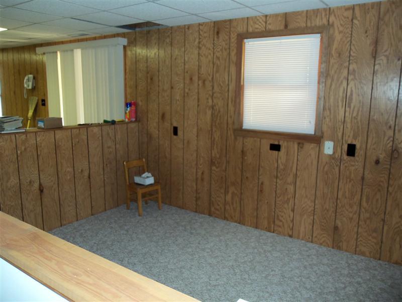 1219 Loggers Road Goodview, VA 24095 - Photo 12 of 21 a view of a hallway with wooden floor