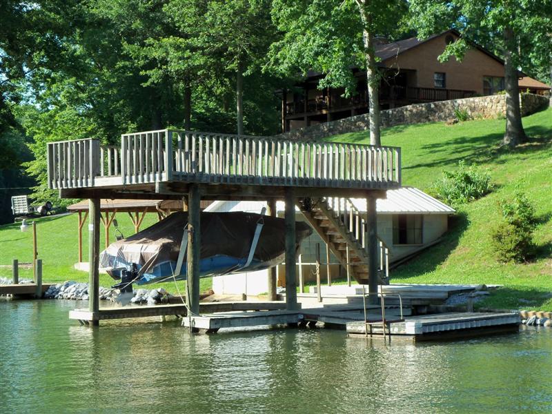 1219 Loggers Road Goodview, VA 24095 - Photo 13 of 21 a view of a house with a yard and swimming pool