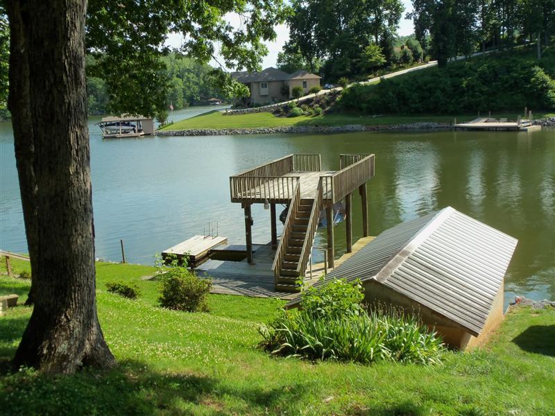 1219 Loggers Road Goodview, VA 24095 - Photo 14 of 21 a view of a garden with lake view