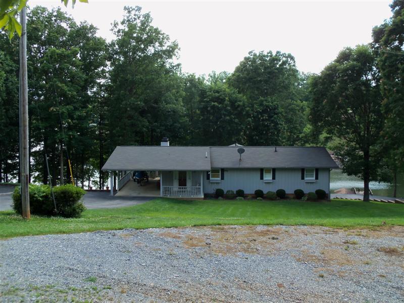 1219 Loggers Road Goodview, VA 24095 - Photo 18 of 21 a view of house with a garden