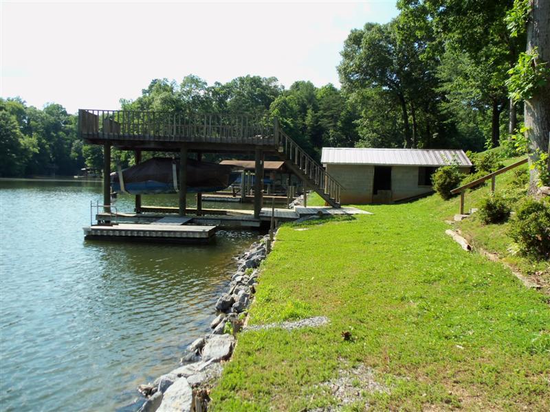 1219 Loggers Road Goodview, VA 24095 - Photo 20 of 21 an aerial view of a house with swimming pool lake view and boat