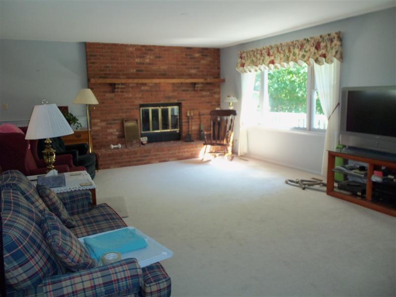 1219 Loggers Road Goodview, VA 24095 - Photo 4 of 21 a living room with furniture and a flat screen tv