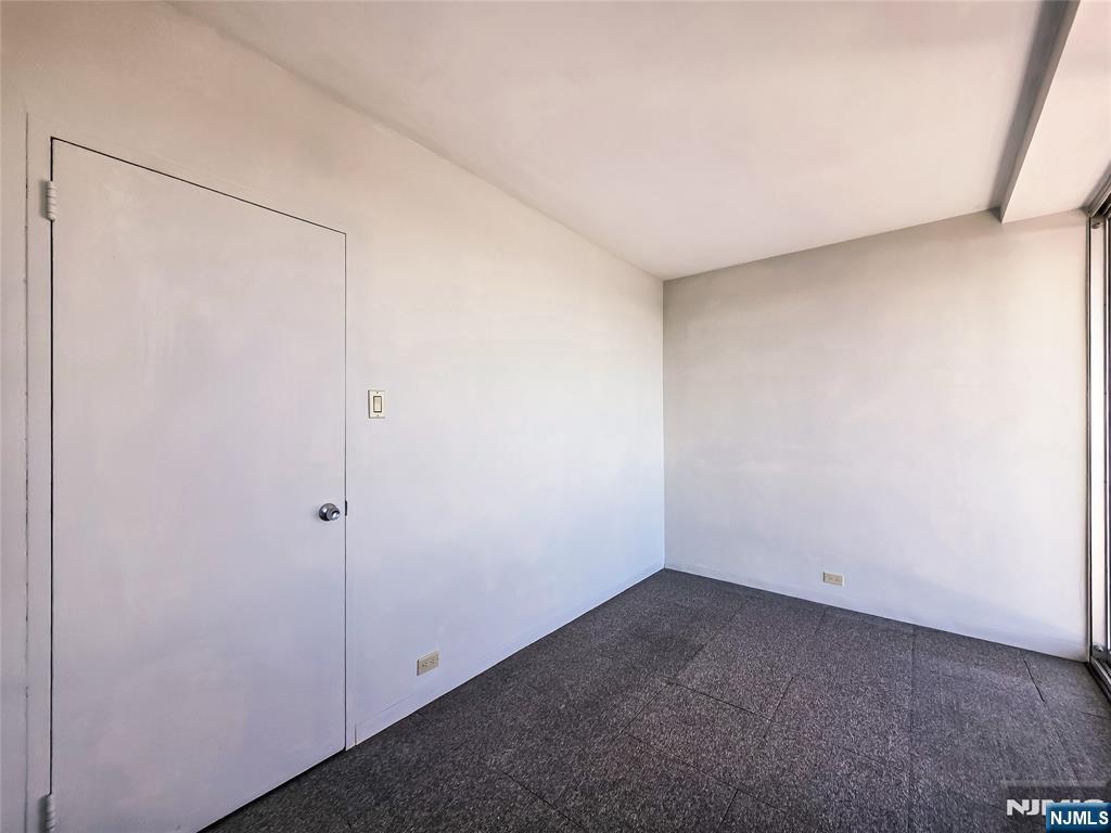 1 Horizon Road, Unit 811 Fort Lee, NJ 07024 - Photo 12 of 17 a view of an empty room