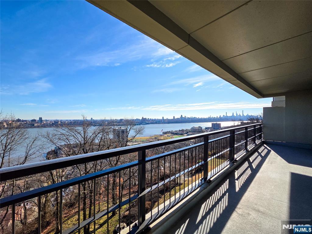 1 Horizon Road, Unit 811 Fort Lee, NJ 07024 - Photo 14 of 17 a view of city from a balcony