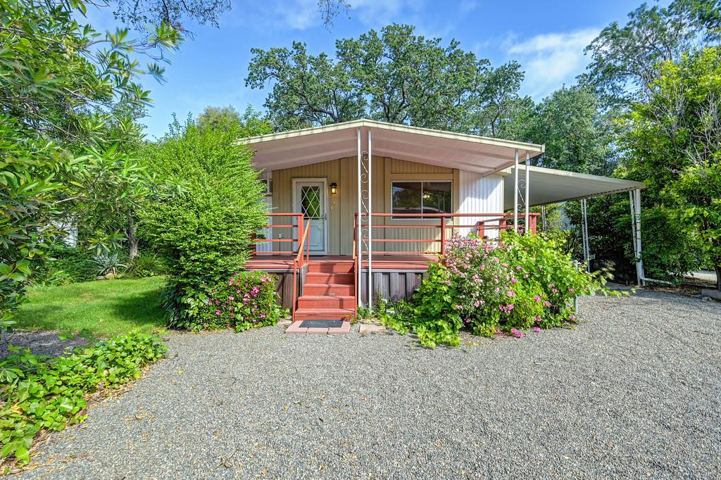 4800 Auburn Folsom Road, Unit 9 Loomis, CA 95650 - Photo 1 of 43 a view of a house with a yard