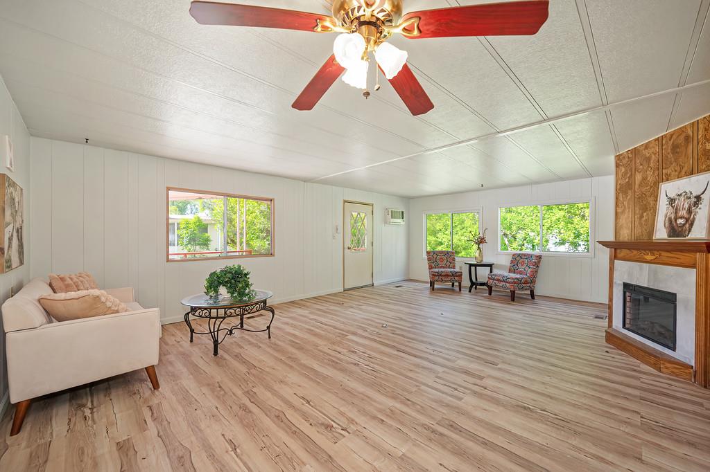 4800 Auburn Folsom Road, Unit 9 Loomis, CA 95650 - Photo 11 of 43 a living room with furniture and a fireplace