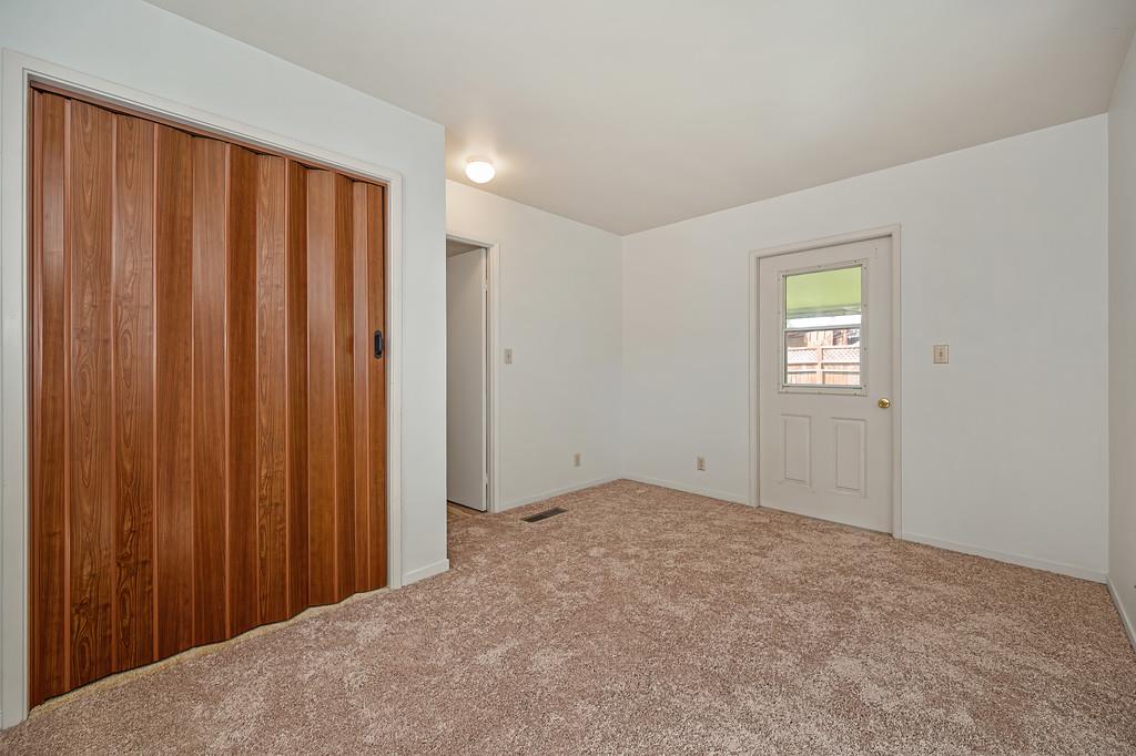 4800 Auburn Folsom Road, Unit 9 Loomis, CA 95650 - Photo 29 of 43 a view of an empty room with wooden door