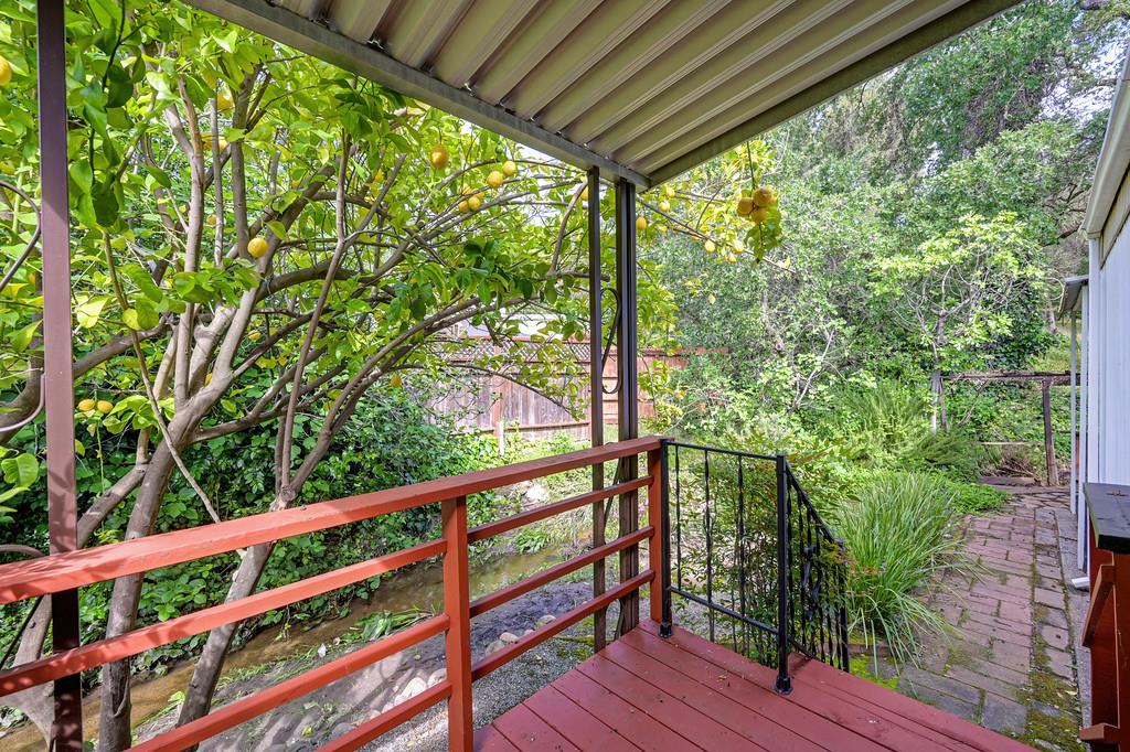 4800 Auburn Folsom Road, Unit 9 Loomis, CA 95650 - Photo 34 of 43 a view of a balcony with wooden floor