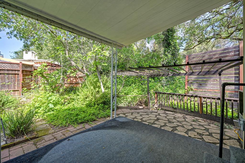 4800 Auburn Folsom Road, Unit 9 Loomis, CA 95650 - Photo 37 of 43 a balcony with trees in the background