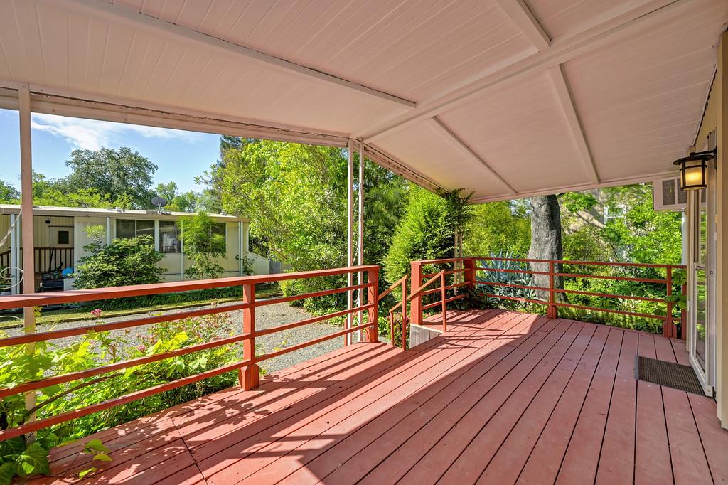 4800 Auburn Folsom Road, Unit 9 Loomis, CA 95650 - Photo 4 of 43 a view of a balcony with wooden floor