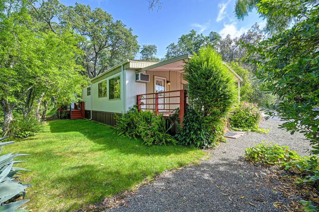 4800 Auburn Folsom Road, Unit 9 Loomis, CA 95650 - Photo 42 of 43 a front view of a house with garden