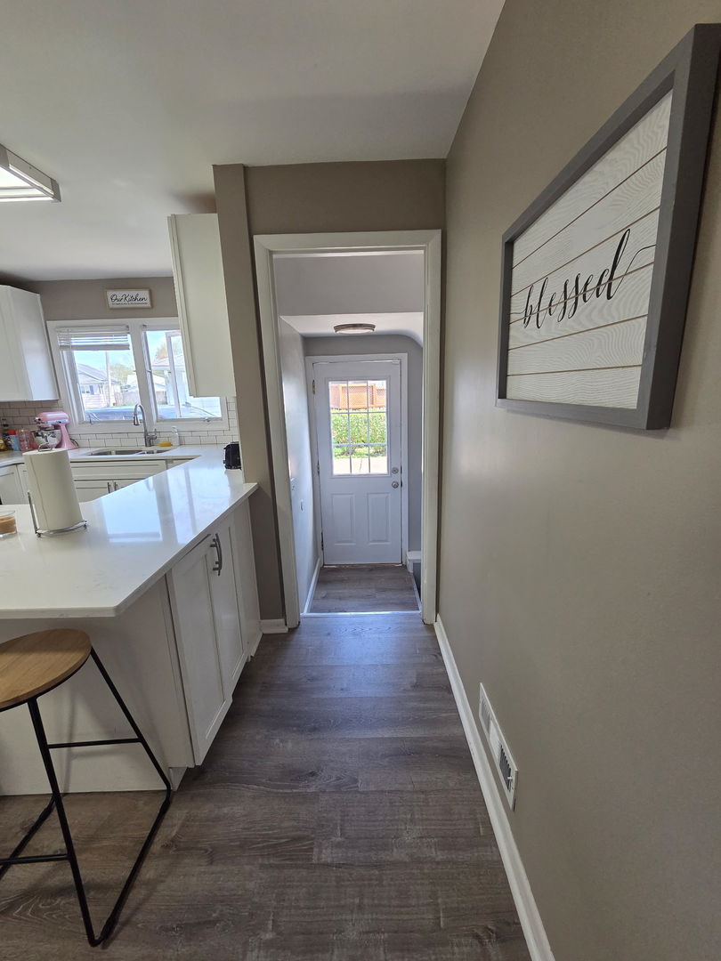 2550 26th Street Rock Island, IL 61201 - Photo 14 of 33 a view of gallery with wooden floor