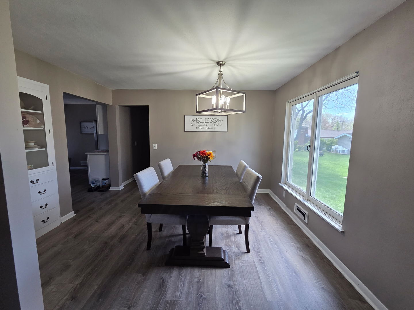 2550 26th Street Rock Island, IL 61201 - Photo 8 of 33 a view of a dining room with furniture window and wooden floor