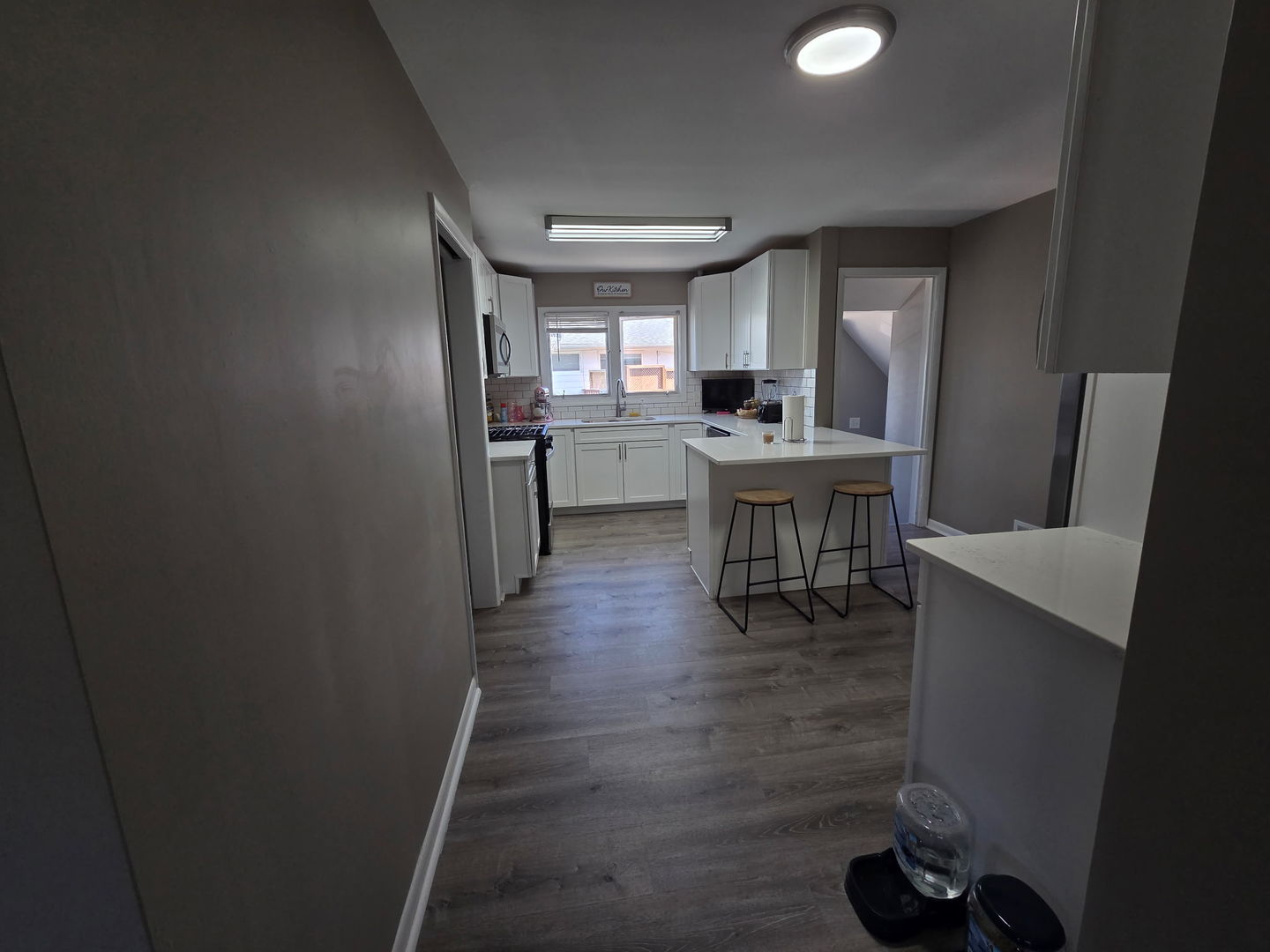 2550 26th Street Rock Island, IL 61201 - Photo 10 of 33 a view of a dining room with furniture window and wooden floor