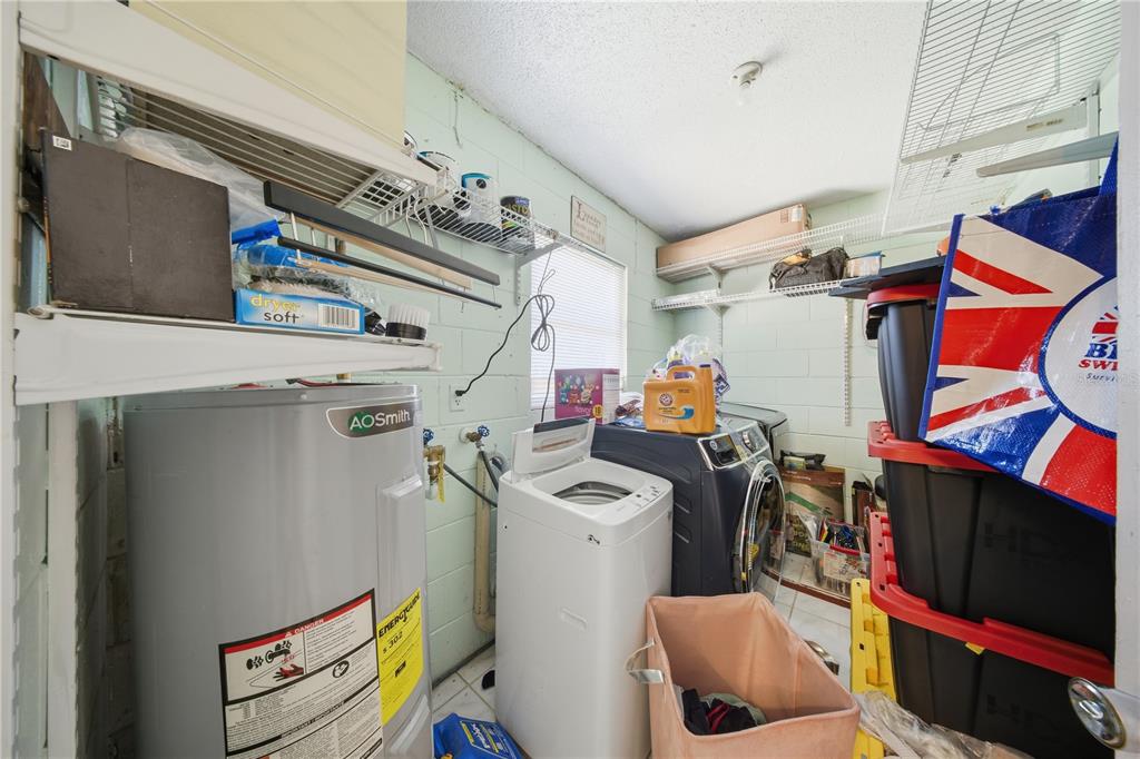 213 South 3rd Street Lake Mary, FL 32746 - Photo 17 of 30 a utility room with dryer and washer