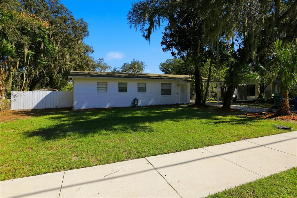 213 South 3rd Street Lake Mary, FL 32746 - Photo 24 of 30 a front view of house with yard and green space