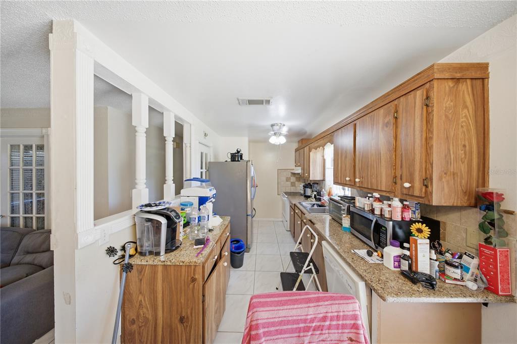 213 South 3rd Street Lake Mary, FL 32746 - Photo 8 of 30 a very nice looking room with a dining table chairs