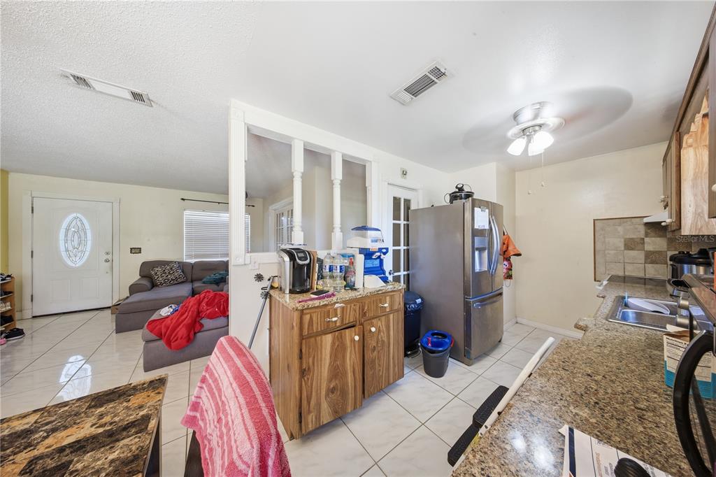 213 South 3rd Street Lake Mary, FL 32746 - Photo 9 of 30 a bed room with a bed and a desk