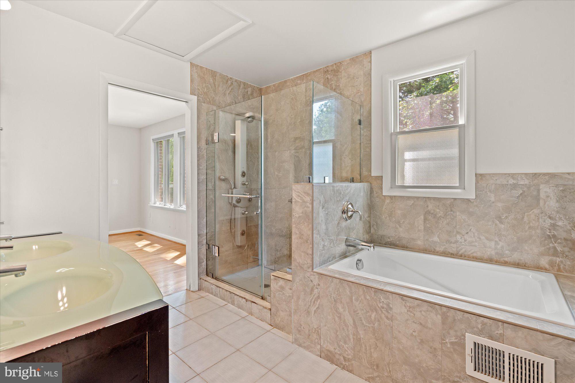 7504 Radnor Road Bethesda, MD 20817 - Photo 28 of 35 Elegant bathroom with modern finishes.
