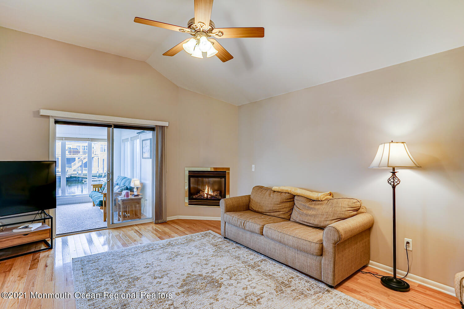 107 Marlin Road Tuckerton, NJ 08087 - Photo 22 of 36 a living room with furniture and a flat screen tv