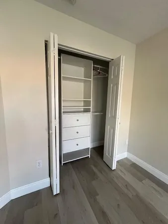 a kitchen with a stove and a microwave