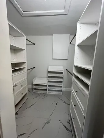 a view of entryway with kitchen