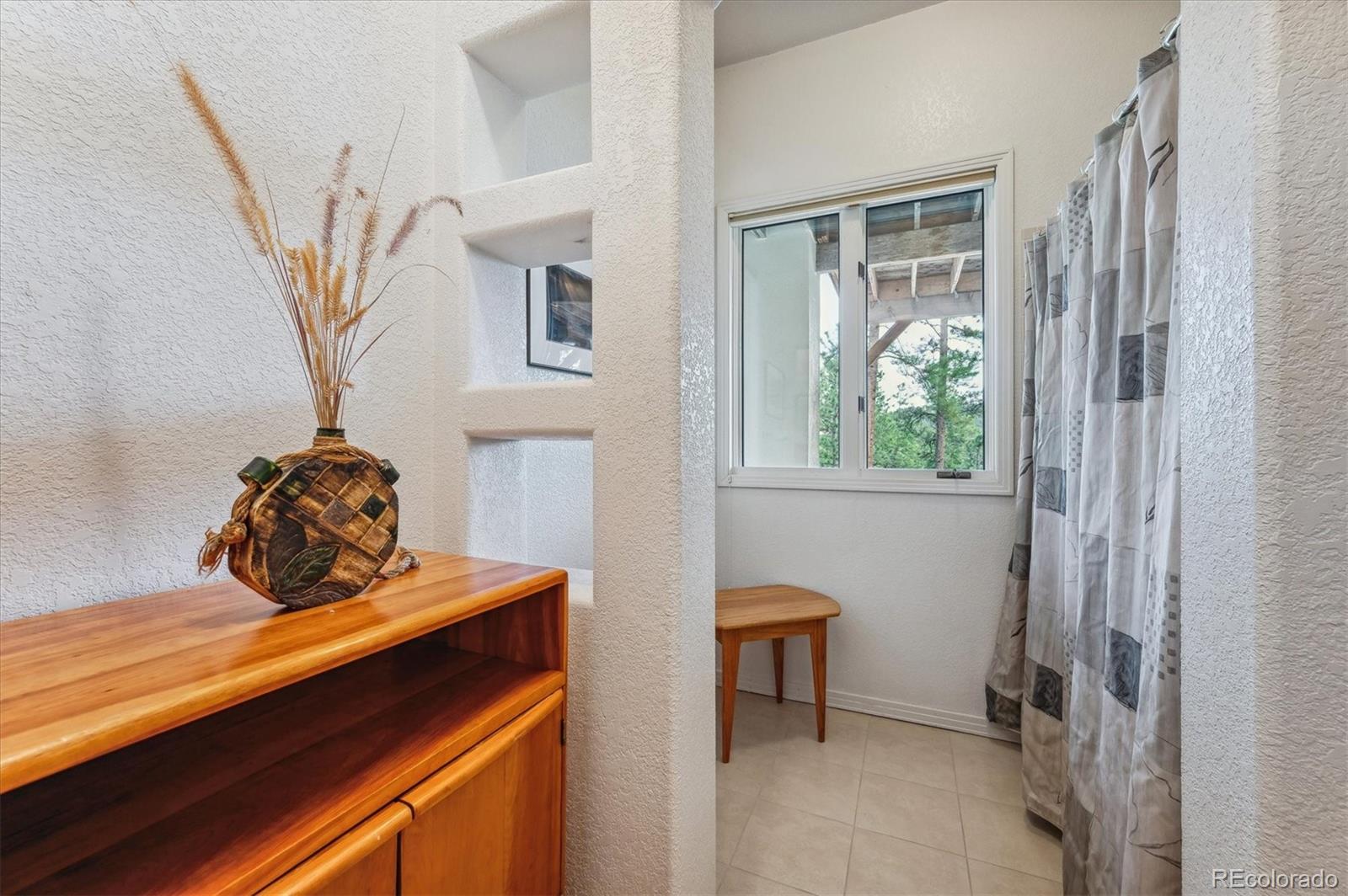 1784 Prima Lane Evergreen, CO 80439 - Photo 31 of 37 a view of a room with a window