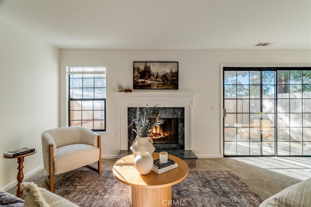 646 Shady Lane Santa Maria, CA 93455 - Photo 10 of 44 a living room with furniture and a fireplace