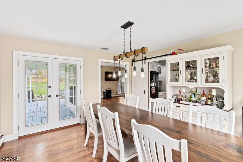 30 Lanning Road Blairstown, NJ 07825 - Photo 12 of 40 a view of a dining room with furniture window and wooden floor