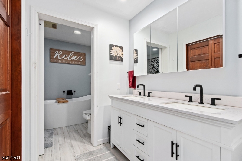 30 Lanning Road Blairstown, NJ 07825 - Photo 17 of 40 a bathroom with a sink and a mirror