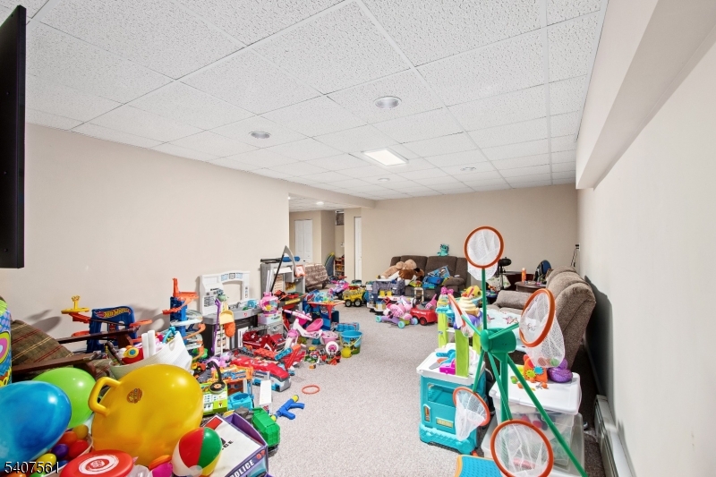 30 Lanning Road Blairstown, NJ 07825 - Photo 27 of 40 a room with toys and a couch